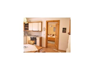 Landhaus Grawa Fulpmes Wohnküche mit Kachelofen