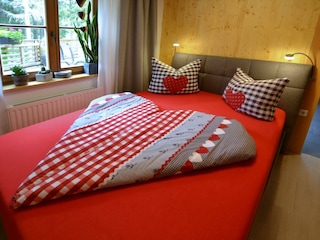 Ferienwohnung Stubaier Herzblut Schlafzimmer mit H