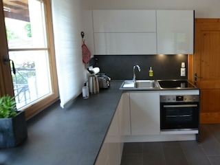 Ferienwohnung Stubaier Herzblut Küche mit Spüle un