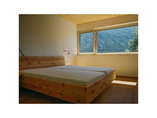 Zirbenholzbetten in beiden Schlafzimmern