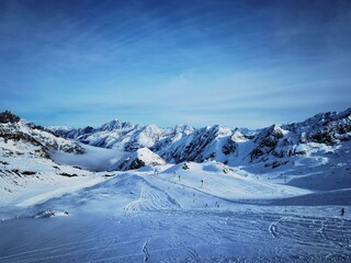 Gletscher Sonne mit Wolken im Tal