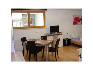 FW Josef Leitgeb Einraumapp.Sitzecke mit TV