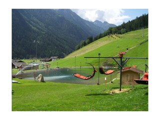 Panoramakarrussel am Gesundheits-See Stubaital