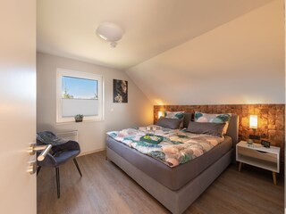 kleines Schlafzimmer im OG