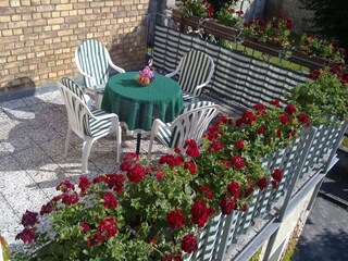 Verweilen Sie auf dem Balkon...