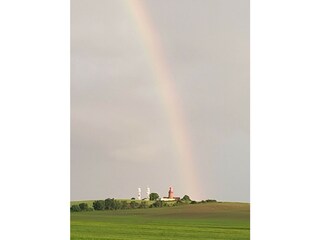 Regenbogen und Leuchtturm