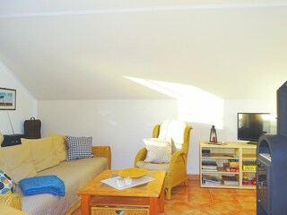 Wohnzimmer mit gemütlichem Schlafsofa für 2