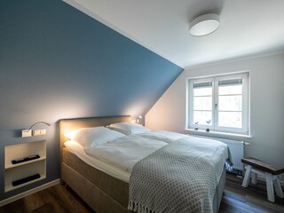 Schlafzimmer 1 im 1. OG gemütlich und geschmackvoll