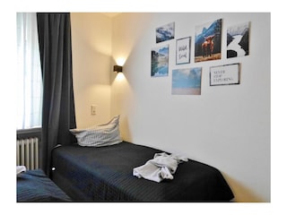 Quartier12*** - Einzelbett im Schlafzimmmer1