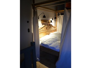 Four-poster bed