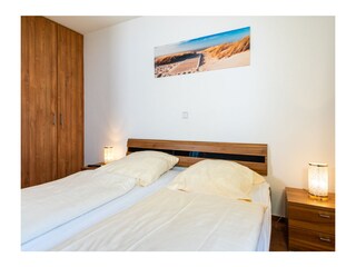 Schlafzimmer mit Doppelbett