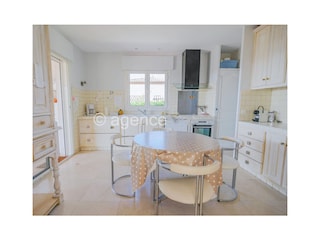 Kitchen with door to dining terrace