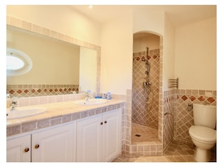 Bathroom with shower and double washbasin