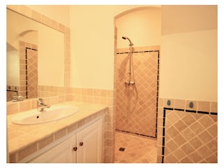 Bathroom with shower and double washbasin