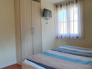 Zweites Schlafzimmer mit Doppelbett