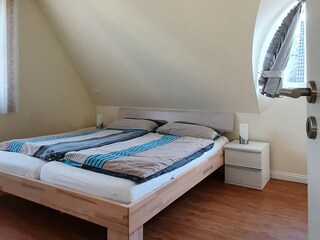 Zweites Schlafzimmer mit Doppelbett