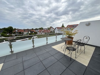 East-facing terrace with seating
