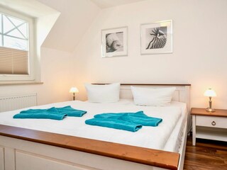Schlafzimmer mit Doppelbett