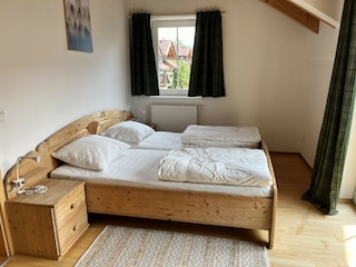 Schlafzimmer mit Balkon