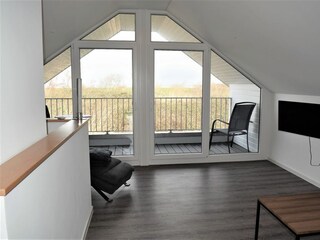 Galerie mit Zugang zur Loggia