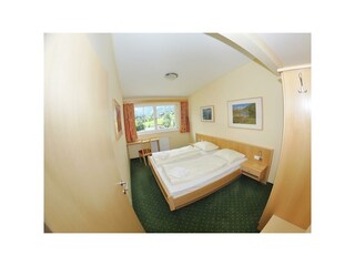 Planai - Appartement - Schlafzimmer mit Ausblick