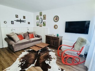 Sofa with rocking chair and TV 2