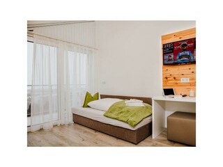 Einzelbett für 3. Person ist im Schlafzimmer 1