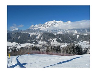 Skipiste neben dem Haus