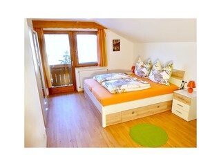 Schlafzimmer mit Balkon