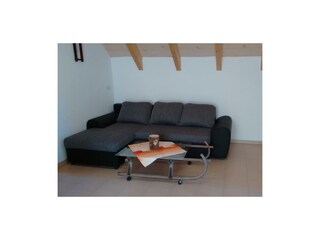 Appartement Iris - Wohnzimmer mit Couch