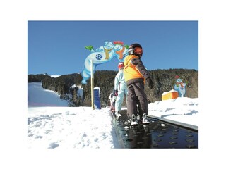 Skifahren Kinder Zauberteppich