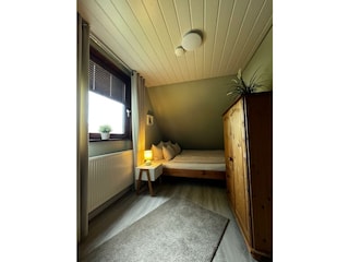 Kleineres Schlafzimmer