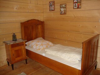 Extra cot in three-bed room