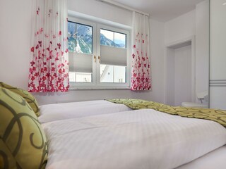 Schlafzimmer im Appartement Alpenrose