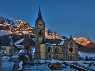Kirche mit Sonnenuntergang vom App.2.Stock aus fot