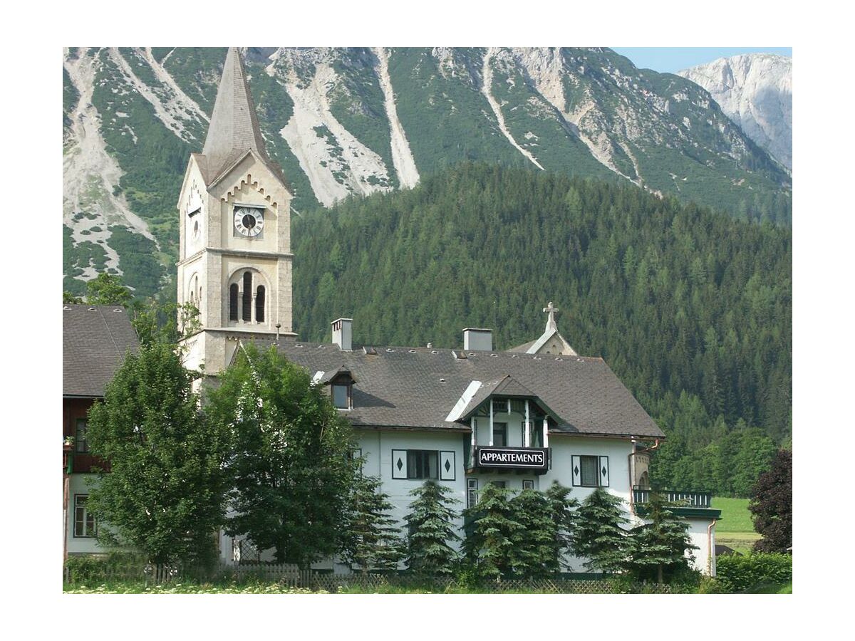 Haus Tritscher 93 Südansicht mit Kirche