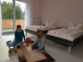 Schlafzimmer mit großem Balkon