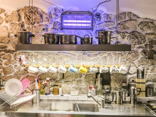 Kitchen with mosquito zapper.