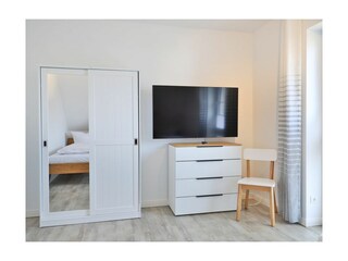 Kapitänshaus - Blick in das Schlafzimmer mit zwei Einzelbetten