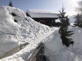 Access to the chalet via a small bridge