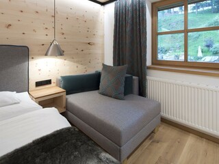 Schlafzimmer mit Chaiselongue