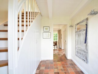 Über die Treppe gelangen Sie in das OG, in welchem sich zwei Schlafzimmer sowie ein weiteres Bade...