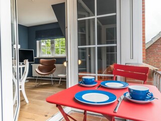 Auf dem Balkon können Sie Ihren Kaffee genießen.