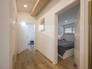 Gang zu Schlafzimmer und Bad
