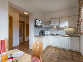 Ferienwohnung mit hellem Wohnraum mit Kochnische