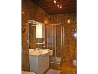 Badezimmer in den Ferienwohnungen