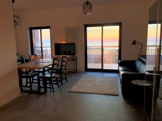 Living room with balcony on the beach