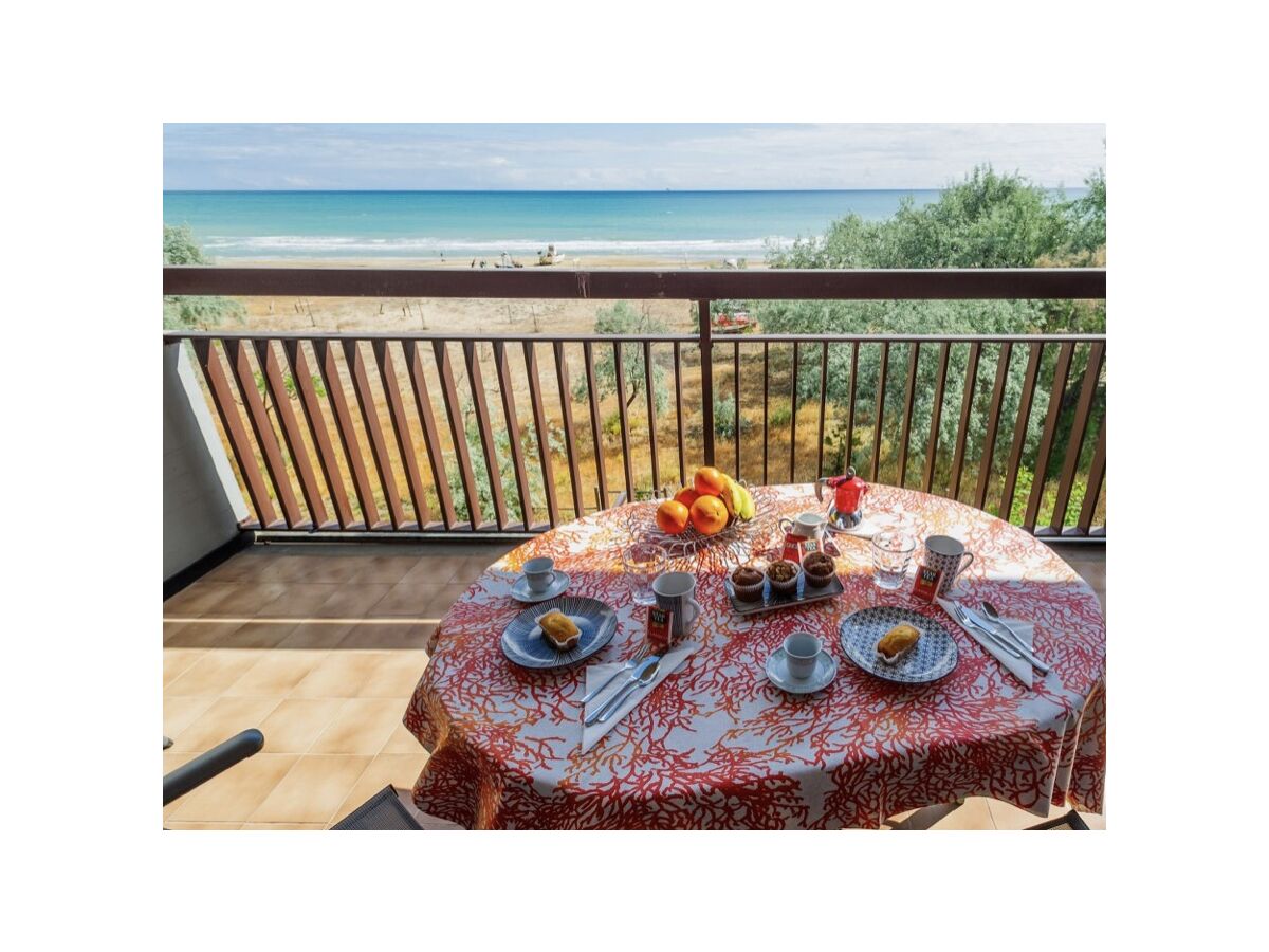 breakfast  on large balcony on the beach