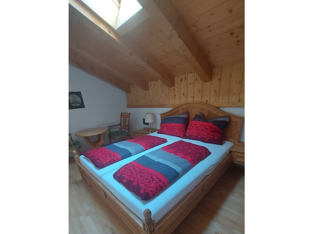 Schlafzimmer mit Sitzecke