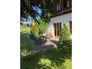 Private garden seating at the holiday apartment
